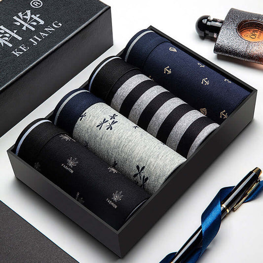 Trendy Men Underwear Pack in elegant gift box, featuring high-quality polyester boxer pants in various patterns and colors.