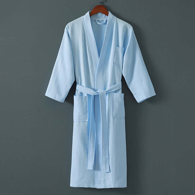 Unisex Spa Robe made from cotton and mink hair fabric, perfect for warmth and comfort during winter, elegant light blue design.