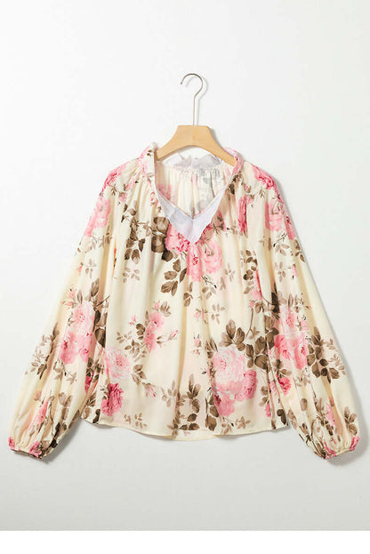 Floral V Neck Chiffon Blouse with pink and brown pattern, featuring long sleeves, on a hanger, perfect for elegant fashion.