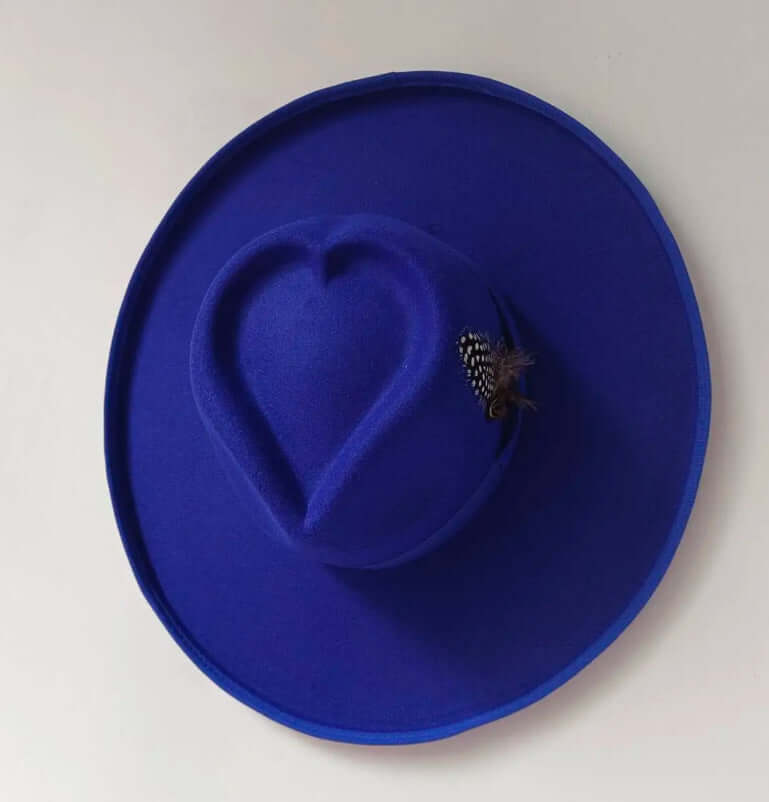 Vibrant blue Heart Hat with heart-shaped crown and feather detail, made from durable woolen fabric for warmth and style.