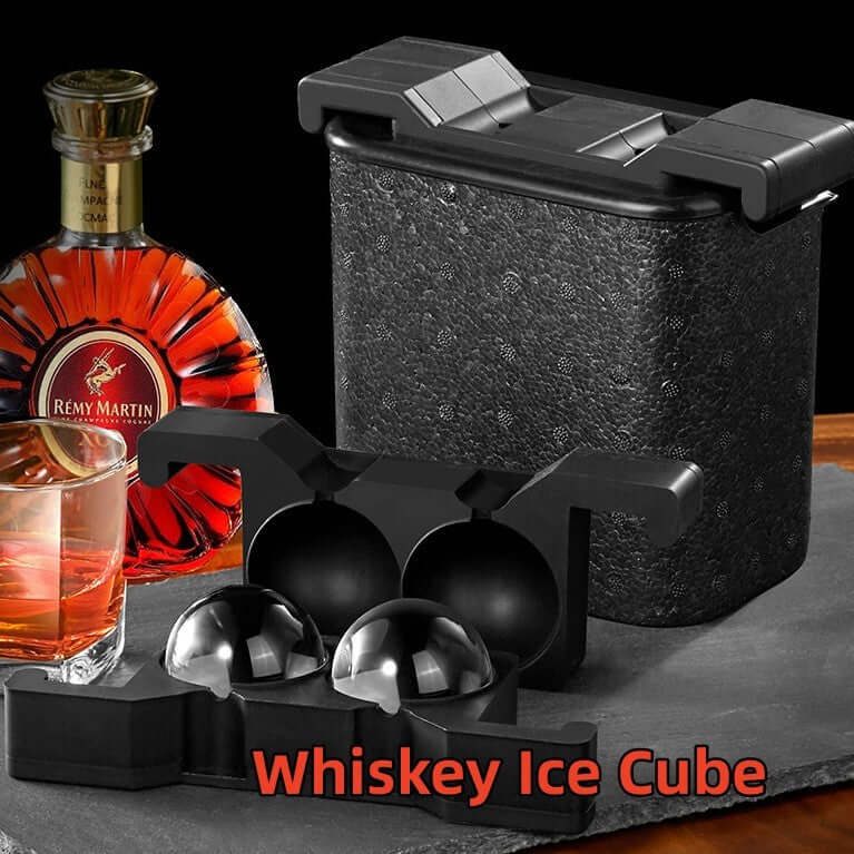Whiskey Ice Mold Tray with ice spheres, bottle, and glass for chilling premium drinks.
