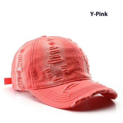 Y-Pink Worn Out Cap showcasing a stylish distressed design, perfect for a trendy look and comfortable wear.