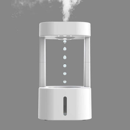 Elegant Anti Gravity Water Droplet Humidifier releasing mist, enhancing ambiance in any space.