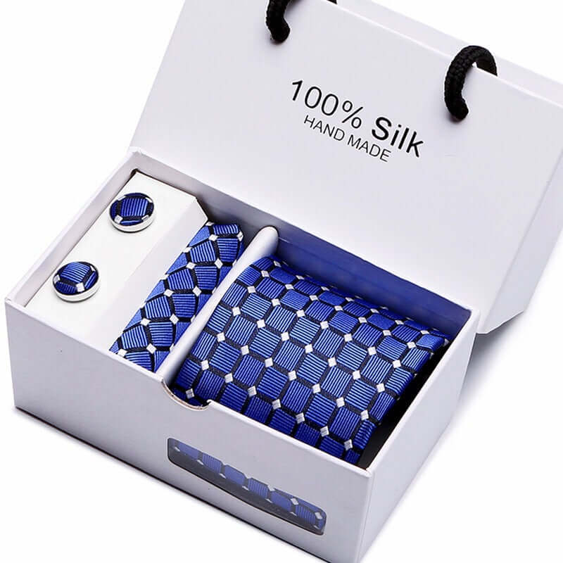 Avant-Garde Tie Set in gift box, featuring blue geometric tie and matching cufflinks, crafted from 100% silk for modern style.