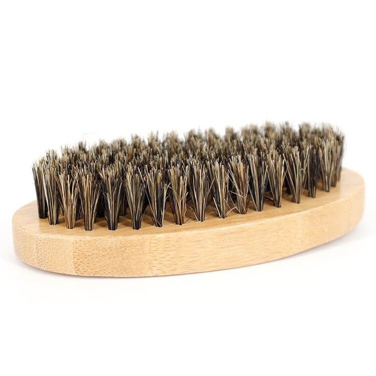 Bristle brush from Beard Grooming Kit for styling and maintaining facial hair