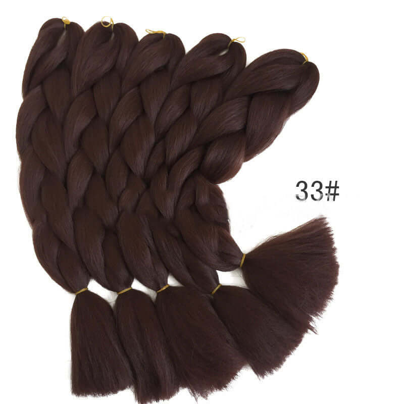 Dark brown braided ponytail hair extension made from high-quality high temperature fiber for a voluminous look. Color: 33#.