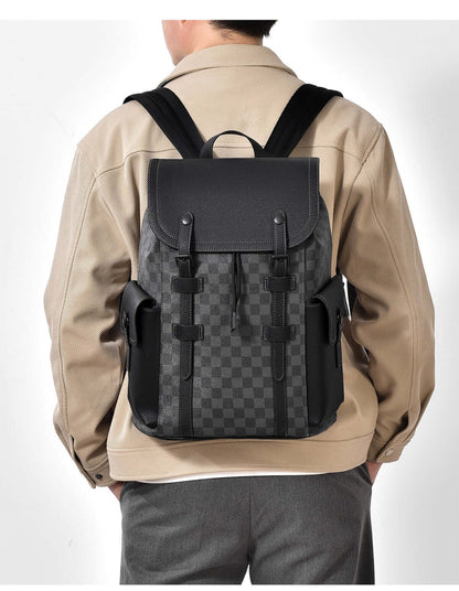 Man carrying a stylish business travel backpack featuring a durable PVC design and spacious compartments