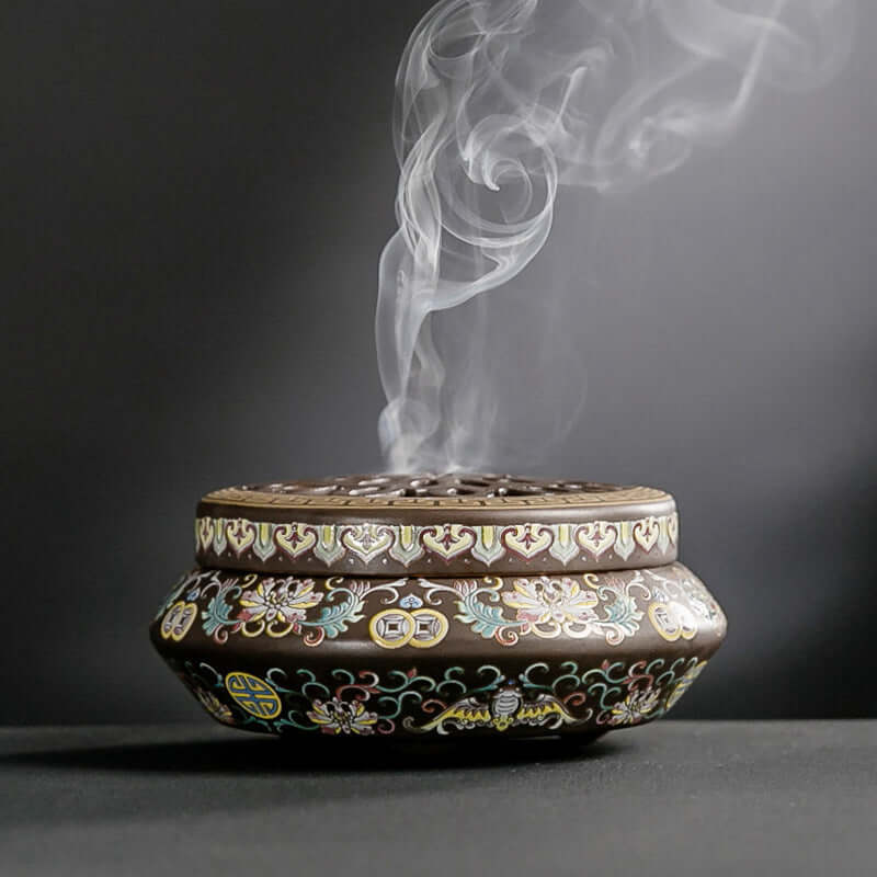 Elegant Ceramic Incense Burner with intricate designs and flowing smoke, perfect for home decor and relaxation.