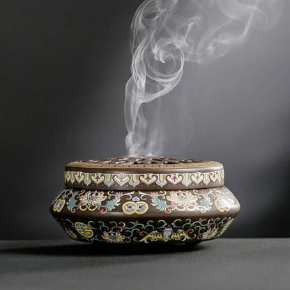 Elegant Ceramic Incense Burner with intricate designs and flowing smoke, perfect for home decor and relaxation.