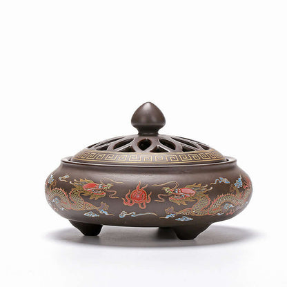 Elegant ceramic incense burner with intricate dragon designs, perfect for enhancing tranquility and style in any space.