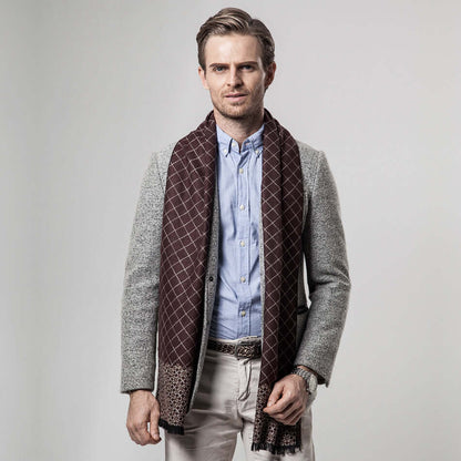 Man wearing a stylish Classic Plaid Warm Scarf in brown, pairing elegance and warmth for the perfect winter fashion statement.