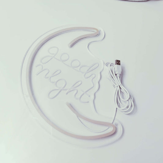 Good night decorative neon light in crescent moon shape with USB cable for cozy home decor.