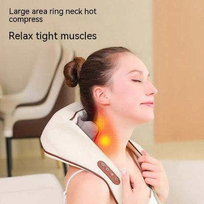 Woman using a Deep Kneading Massager with heat compress to relax neck muscles in an indoor setting.