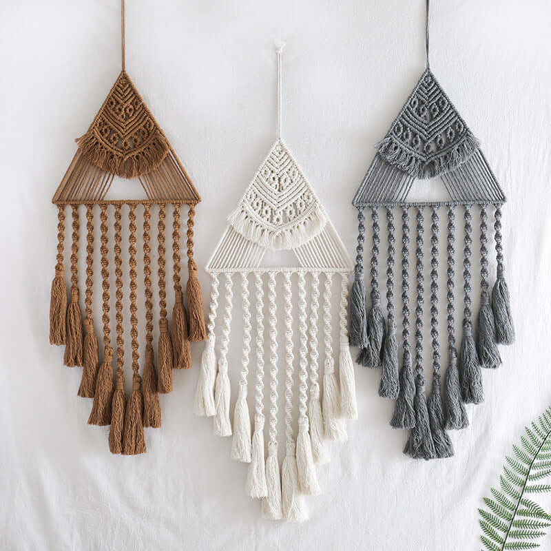Elegant Dream Catcher Home Decor featuring three macrame wall hangings in brown, white and gray.