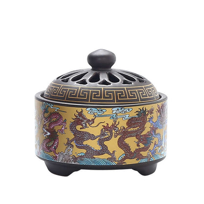 Elegant ceramic incense burner featuring intricate dragon designs and a decorative lid, perfect for home decor.