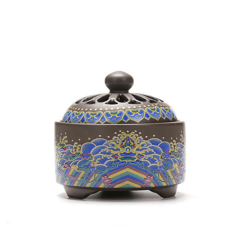 Elegant ceramic incense burner featuring intricate blue and colorful patterns, perfect for home decor and tranquility.