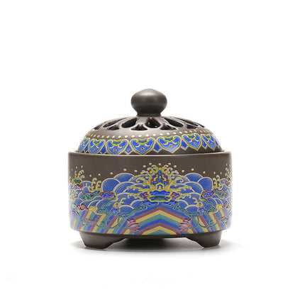 Elegant ceramic incense burner featuring intricate blue and colorful patterns, perfect for home decor and tranquility.