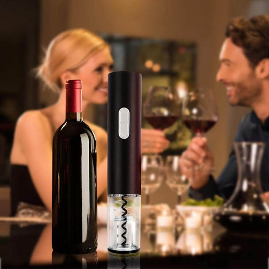 Electric wine opener displayed next to a wine bottle, perfect for effortless uncorking during a dinner.