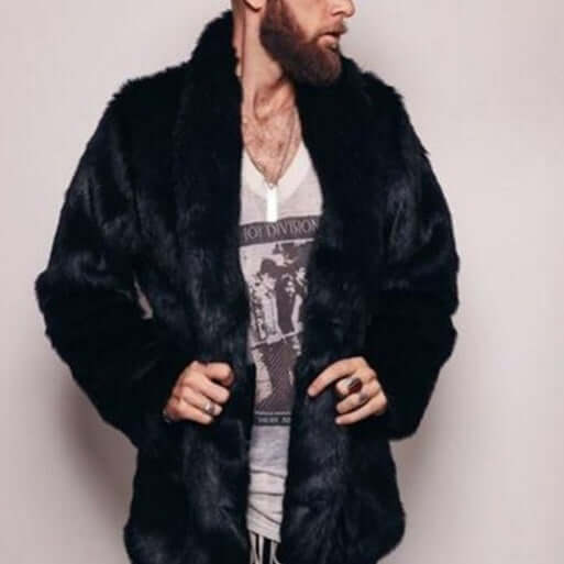 Man wearing a stylish black mink-like faux fur coat, showcasing winter fashion and elegance.