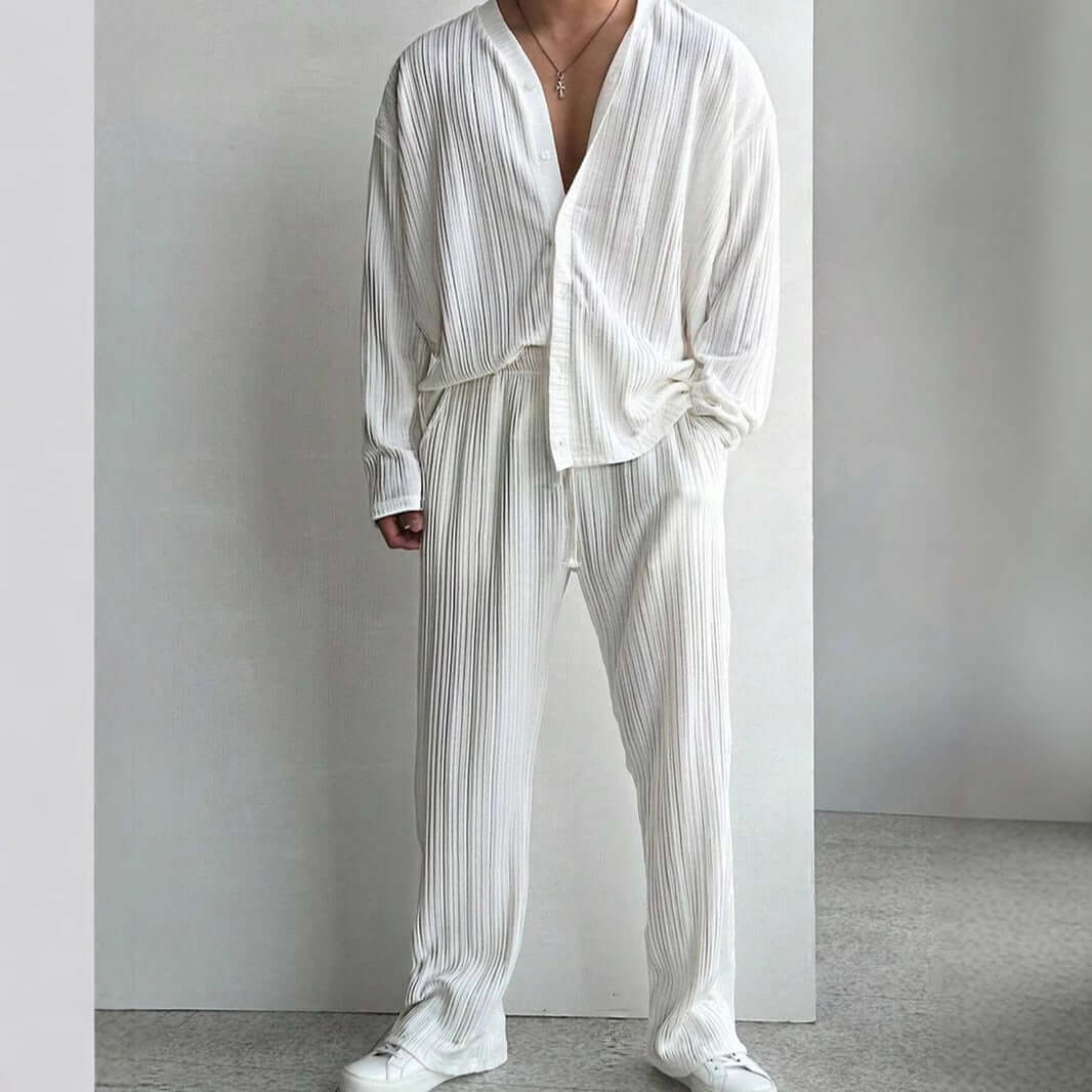Elegant white loungewear outfit with pleated design, offering ultimate comfort and style for a relaxing day at home. Perfect casual wear.