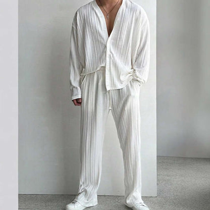 Elegant white loungewear outfit with pleated design, offering ultimate comfort and style for a relaxing day at home. Perfect casual wear.