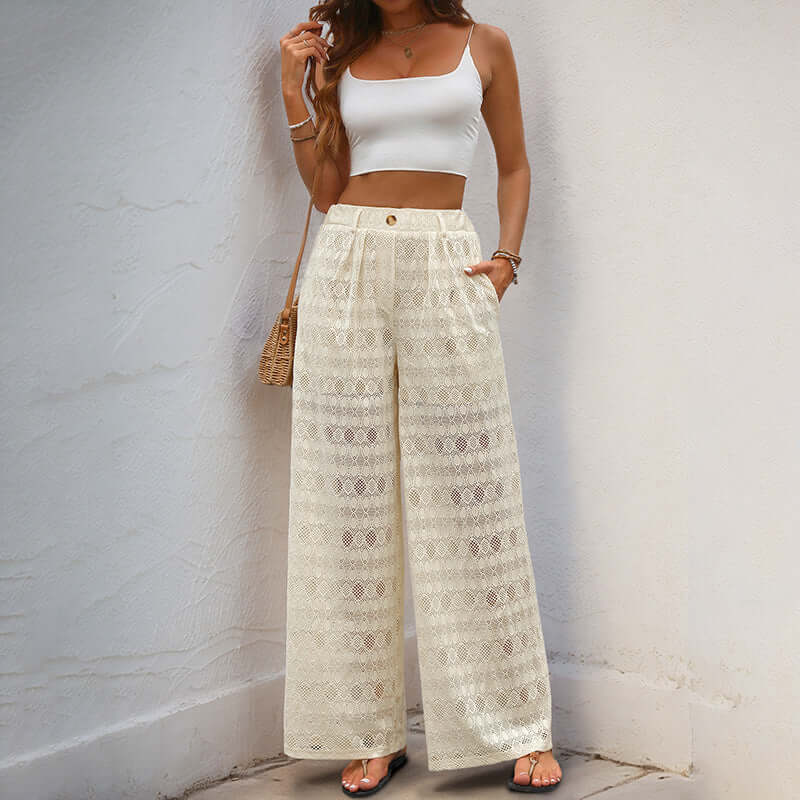 Woman wearing apricot Lace Wide Leg Trousers with high waist and micro elasticity for style and comfort.
