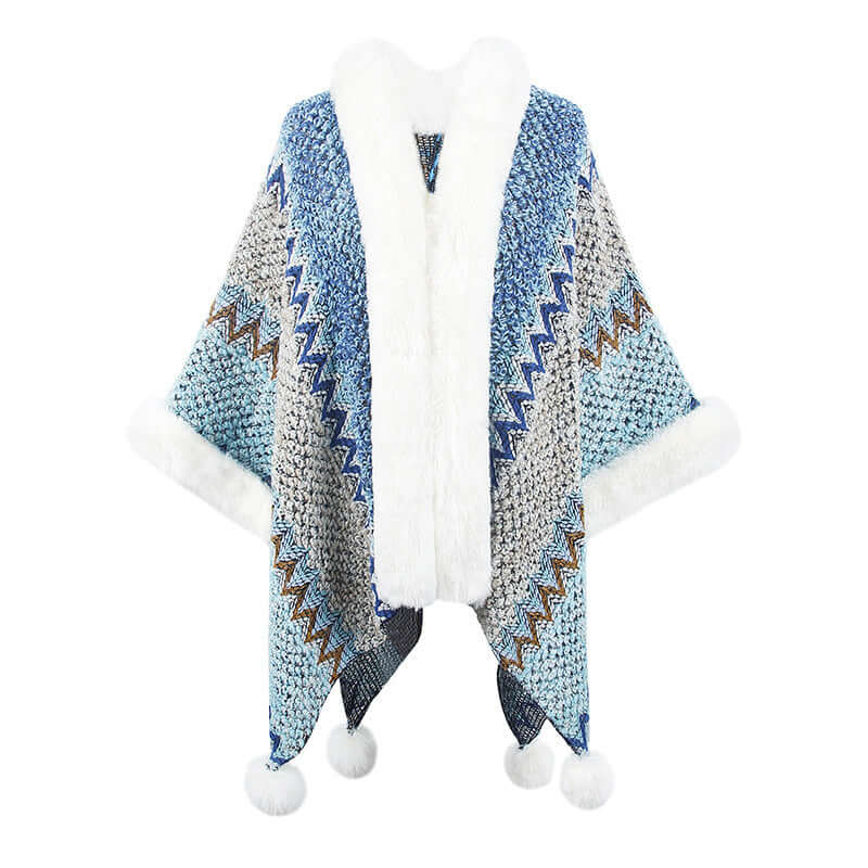 Fur Trimmed Poncho in blue and grey with pom pom details, perfect for stylish autumn and winter outfits.