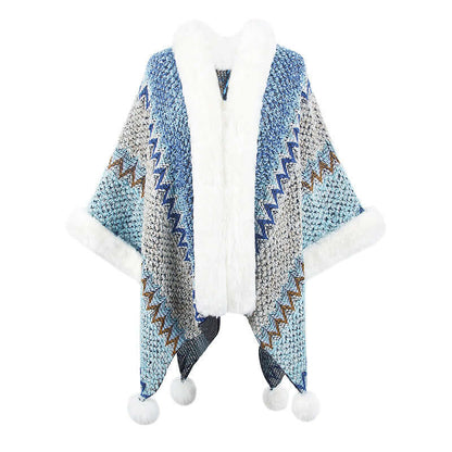 Fur Trimmed Poncho in blue and grey with pom pom details, perfect for stylish autumn and winter outfits.