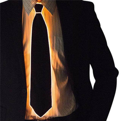 Person wearing a Glowing Necktie in a dark suit, perfect for making a stylish statement at parties and events.
