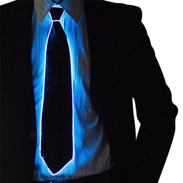 Person wearing a Glowing Necktie at night, highlighting style with a striking blue luminescent design suitable for parties and events.
