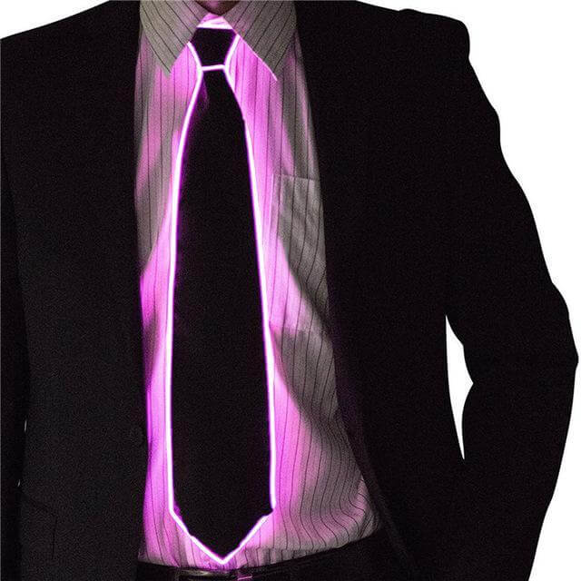 Man wearing a glowing necktie in bright pink, standing out against a formal suit, perfect for parties or events.