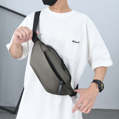Person wearing a sleek, waterproof High Capacity Waist Bag, ideal for active individuals, providing ample space for essentials.