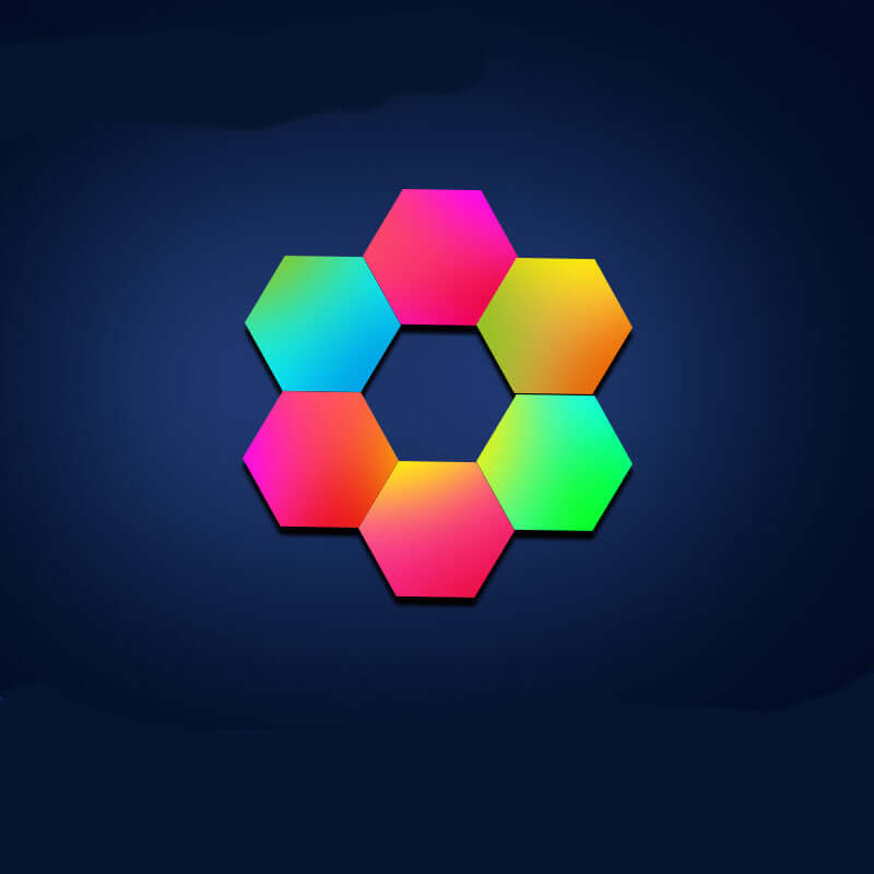 Honeycomb-shaped colorful wall lamp design illuminating dark room, enhancing modern decor with vibrant hexagonal patterns.