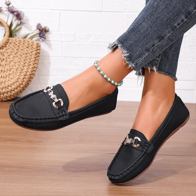 Women's black loafers, low top, featuring chic design; perfect for comfort and style, available in sizes 36-42. Ladies Comfortable Loafers.