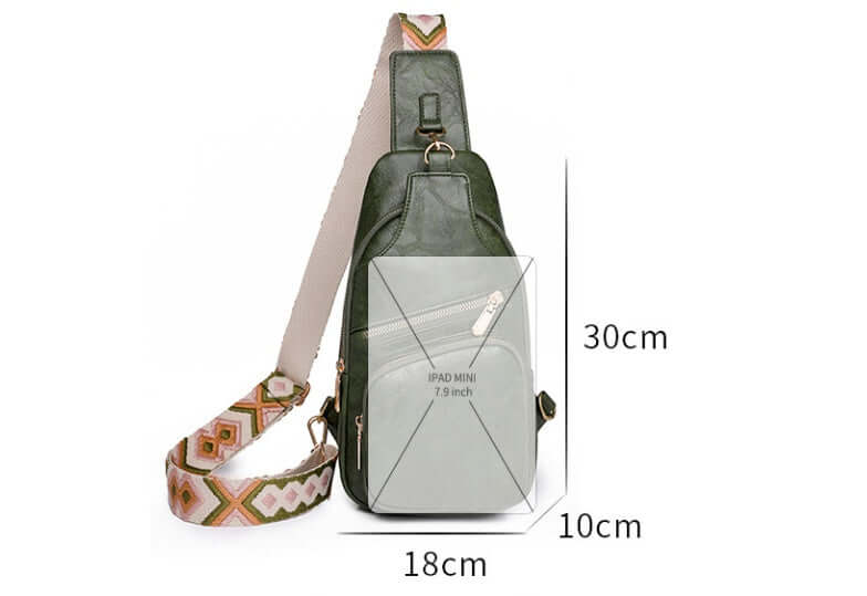 Ladies Cross Shoulder Bag in PU leather with adjustable strap, 30cm tall, fits iPad mini, showcasing functionality and style.