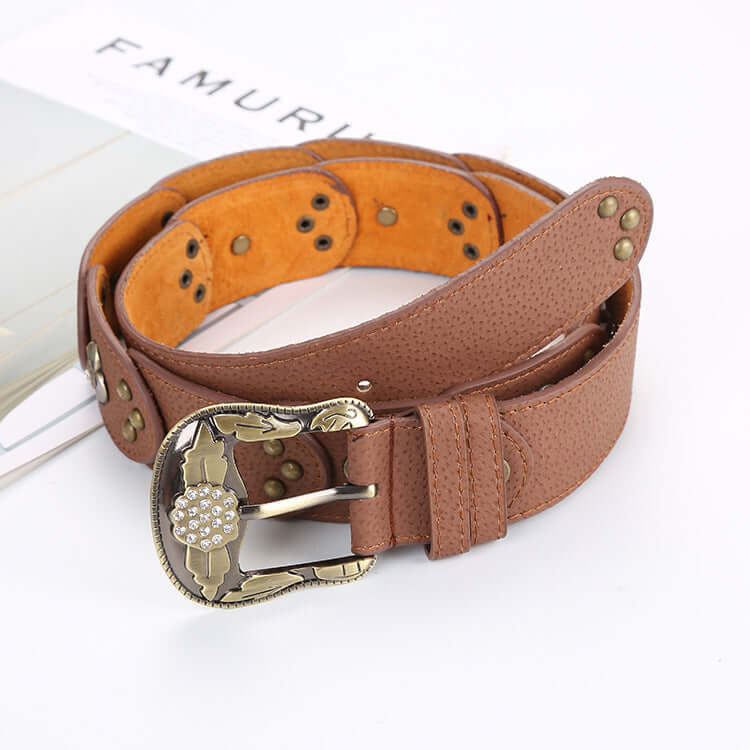 Leather Floral Belt featuring intricate flower design and stylish buckle for an elegant wardrobe accessory.