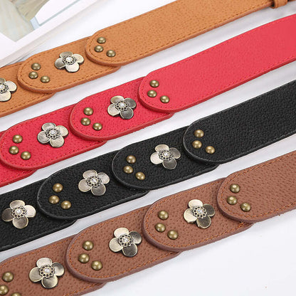 Leather Floral Belts in various colors with decorative floral embellishments and studs.