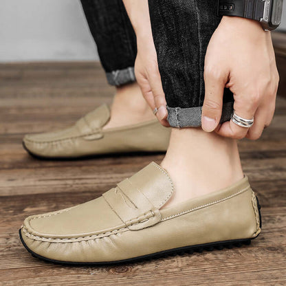 Man wearing khaki Leather Gommino Driving Shoes with durable rubber sole, showing stylish tall crown design.