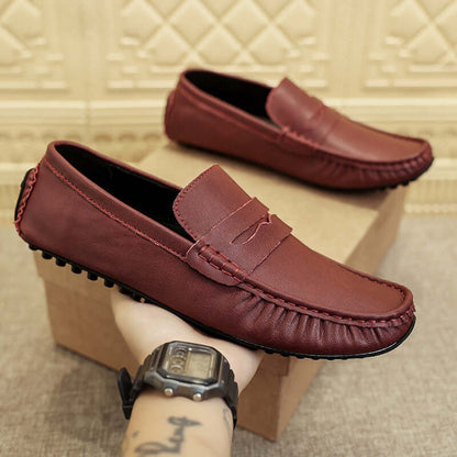 Elegant wine red Leather Gommino Driving Shoes with durable rubber sole for modern men seeking comfort and style.