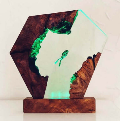 Unique Luminous Diver Night Lamp with geometric wooden design, glowing green light, perfect for bedroom decor.