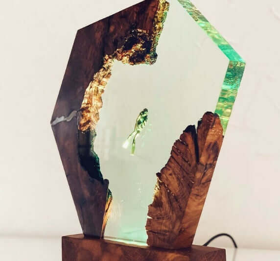 Luminous Diver Night Lamp with unique geometric design, featuring elegant wood and resin accents, adds enchanting charm to your space.