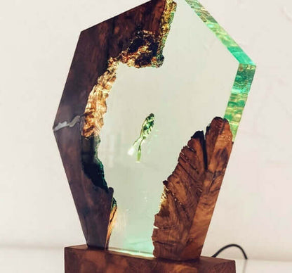 Luminous Diver Night Lamp with unique geometric design, featuring elegant wood and resin accents, adds enchanting charm to your space.