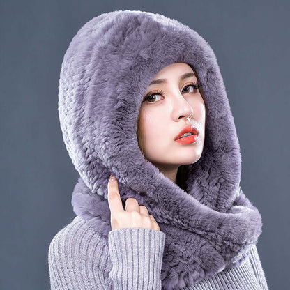 Model showcasing a luxurious faux Fur Hat with Scarf in soft gray, perfect for winter elegance and warmth.