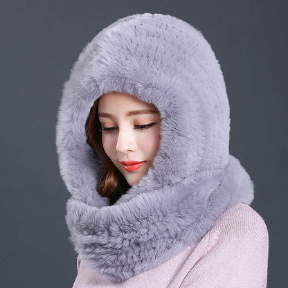 Luxurious gray faux fur hat with integrated scarf, perfect for stylish winter outfits and warmth.