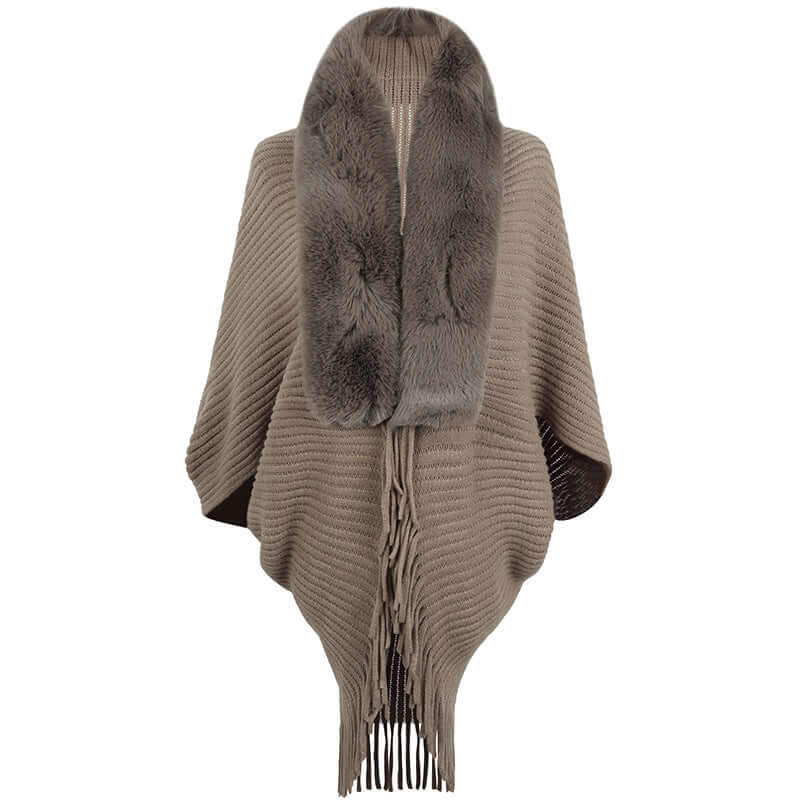 Stylish fur jacket shawl with fringe details, offering elegance and warmth for any occasion.