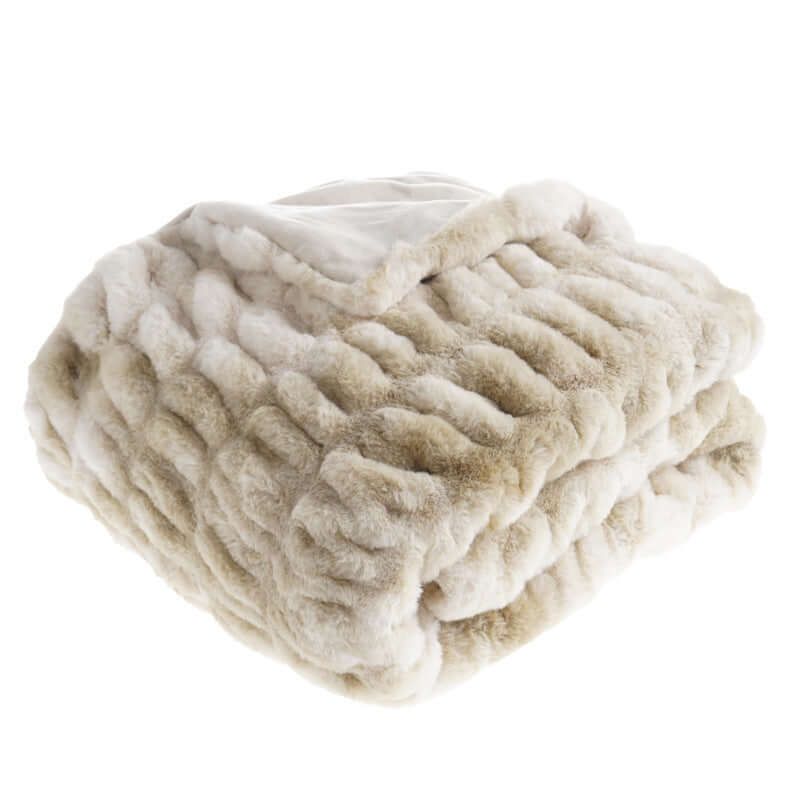 Cozy Faux Fur Pelt Blanket in soft beige hues, adding luxury and warmth to any home decor.
