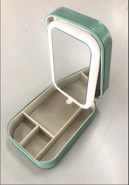 Makeup Storage Box with mirror and compartments for organized cosmetic storage and easy access.