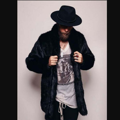 Man wearing a stylish mink-like faux fur coat and black hat, showcasing fashionable winter attire.