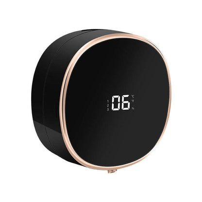 Sleek black and rose gold motion sensor soap dispenser with digital display for modern hygiene solutions.