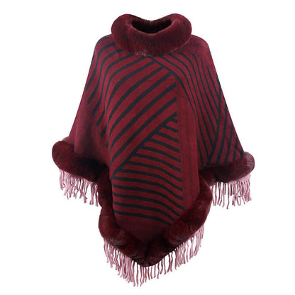 Fashionable Poncho Coat with Fur Trim in deep burgundy, featuring stripes and fringe details for elegant outerwear.